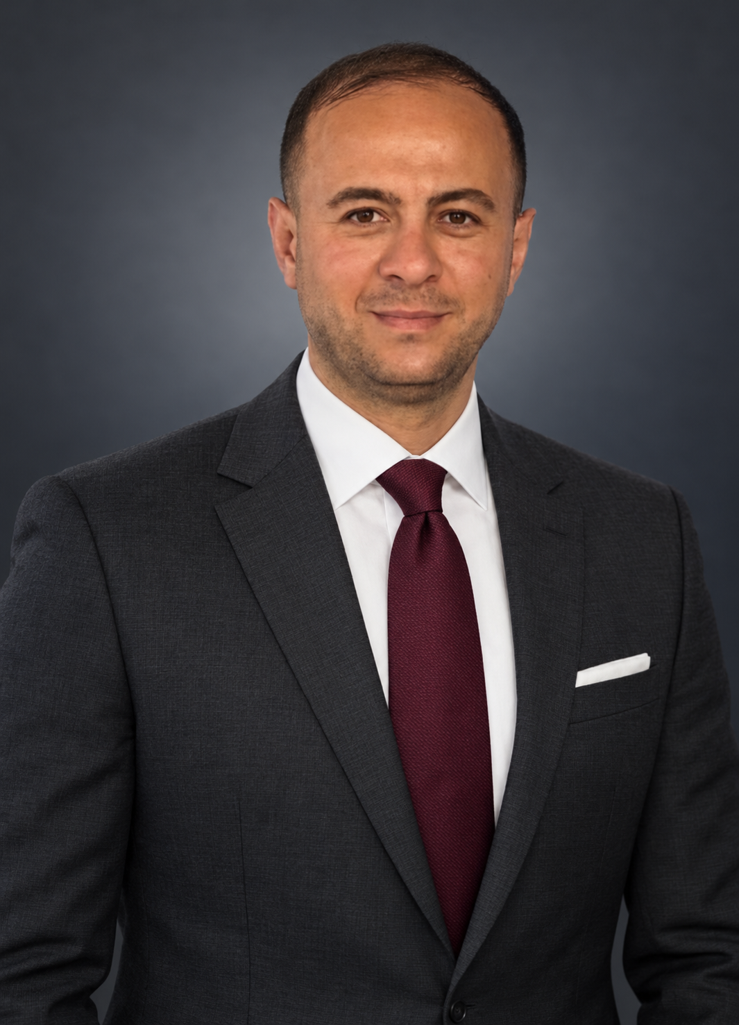 Executive Portrait in Charcoal and Burgundy.png Executive Portrait in Charcoal and Burgundy.png